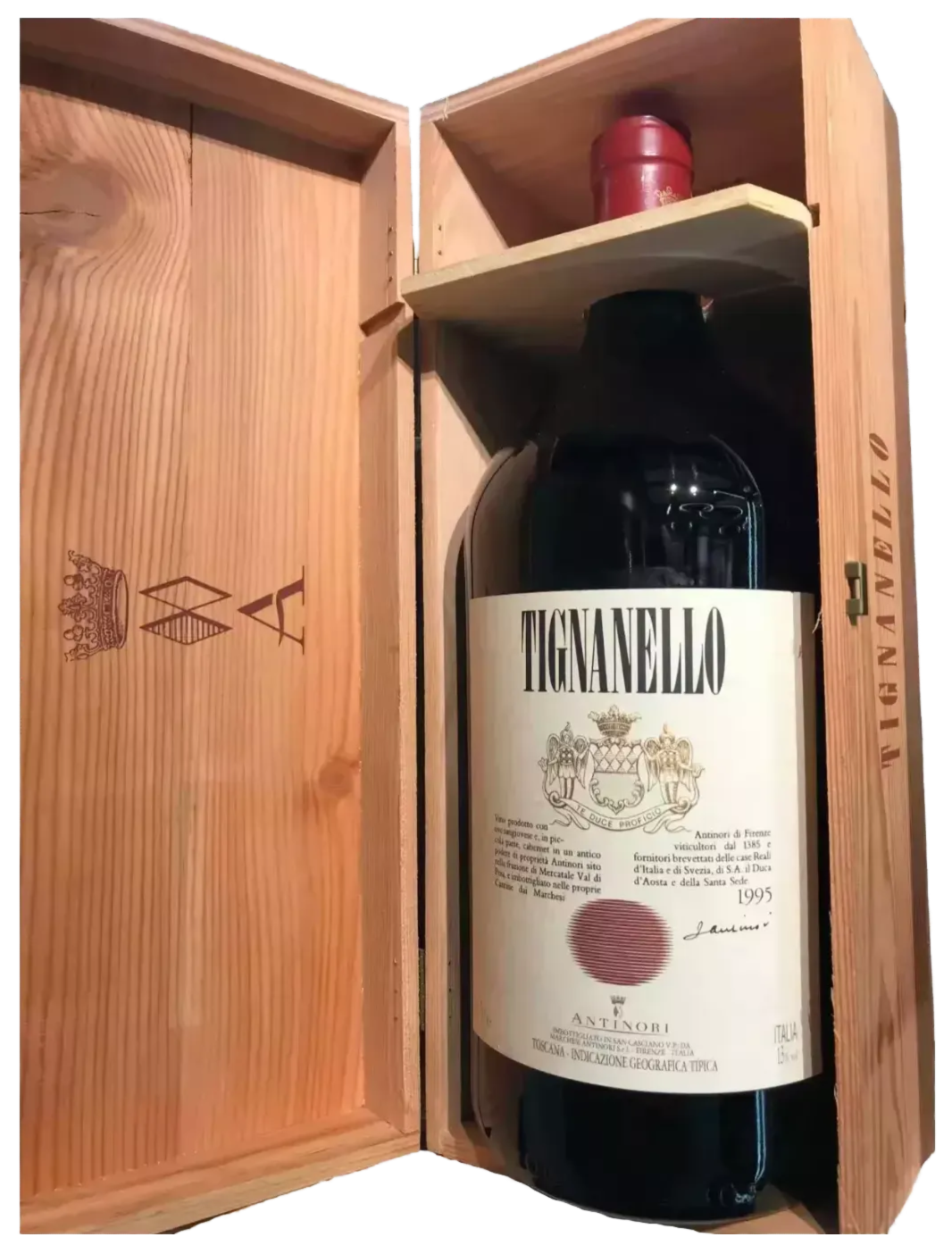 A large bottle of Tignanello wine is displayed in a wooden box, with the label facing the camera.